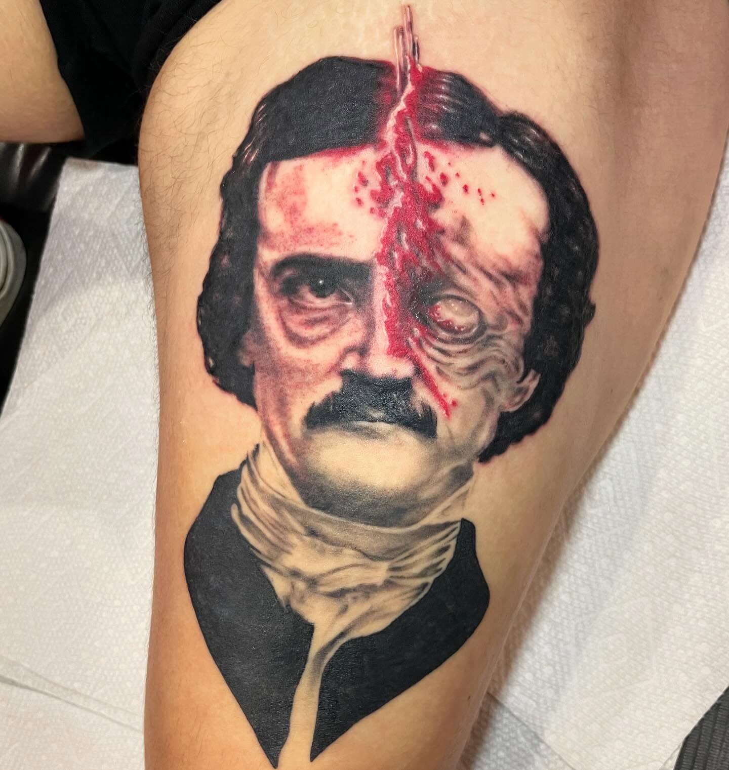 Edgar Allan Poe realism tattoo on the thigh by Chrissy Ungrew Tattoos, Covington, Kentucky