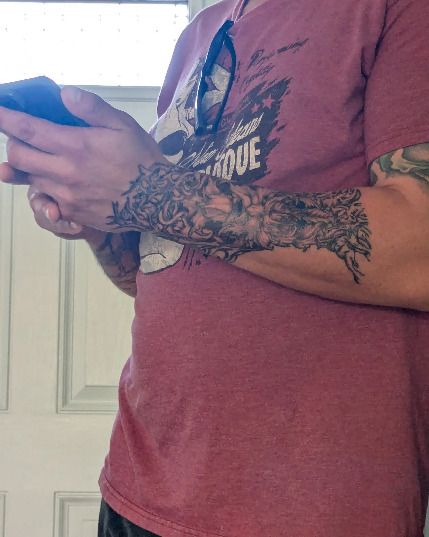 Floral design black and grey tattoo on the forearm by Bobby Batts, Chesterfield, Virginia