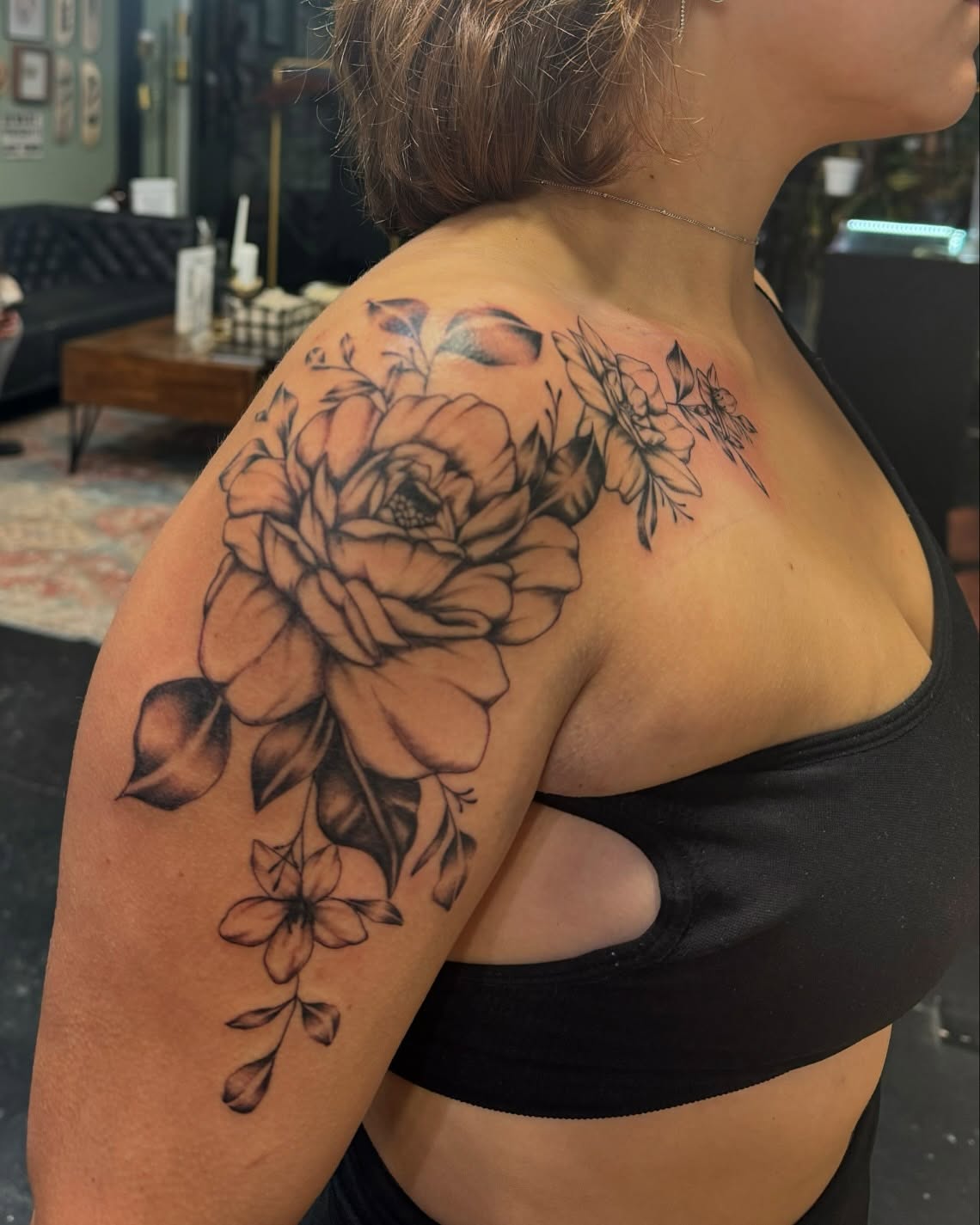 Floral bouquet black and grey tattoo on the shoulder by Kenzie🖤