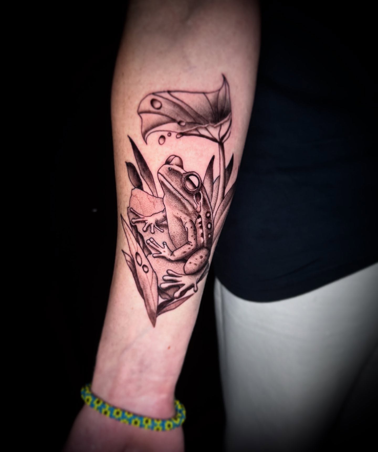 Frog realism tattoo on the forearm by Terence Taylor