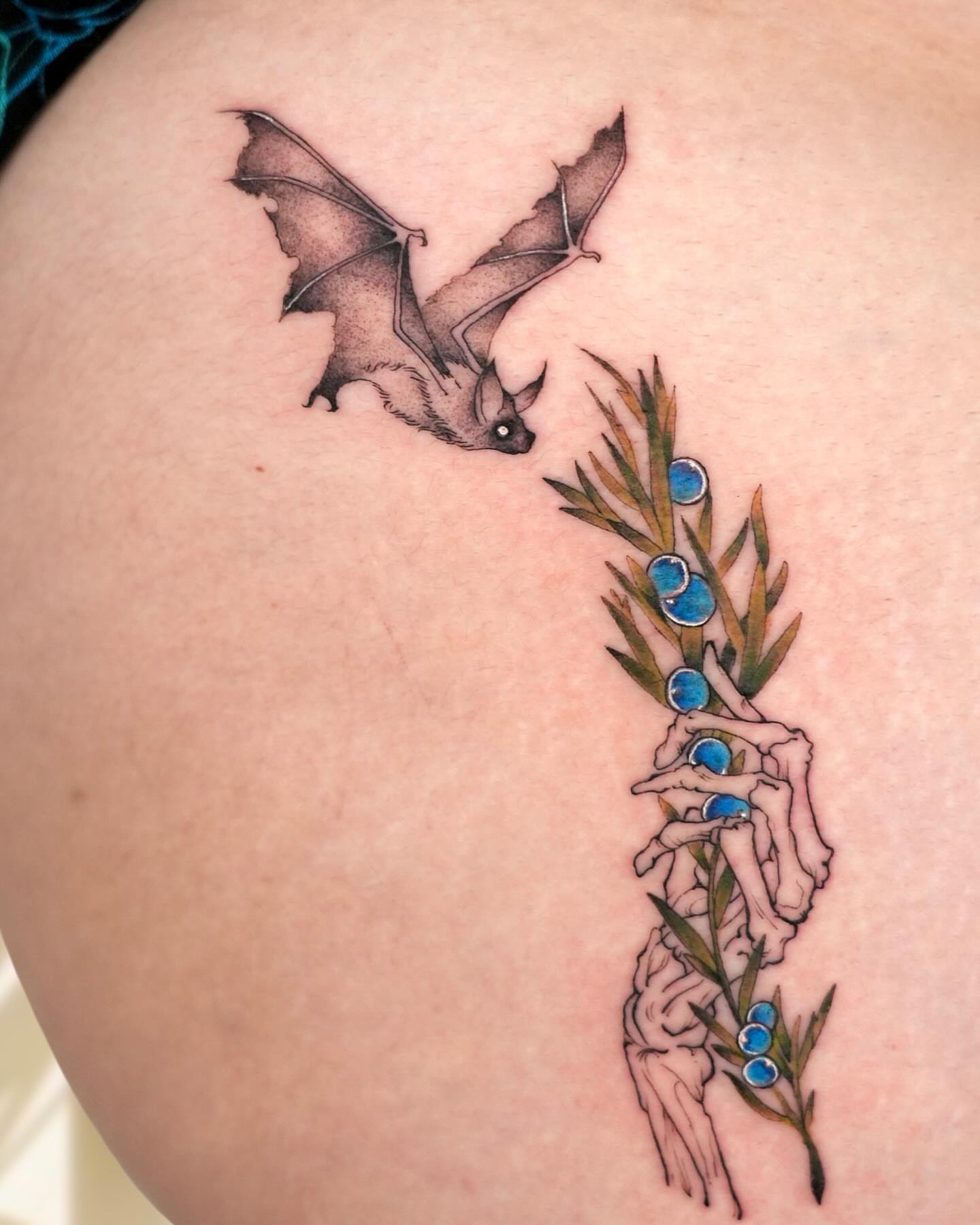 Bat and plant realism tattoo on the shoulder by Marianna D D King