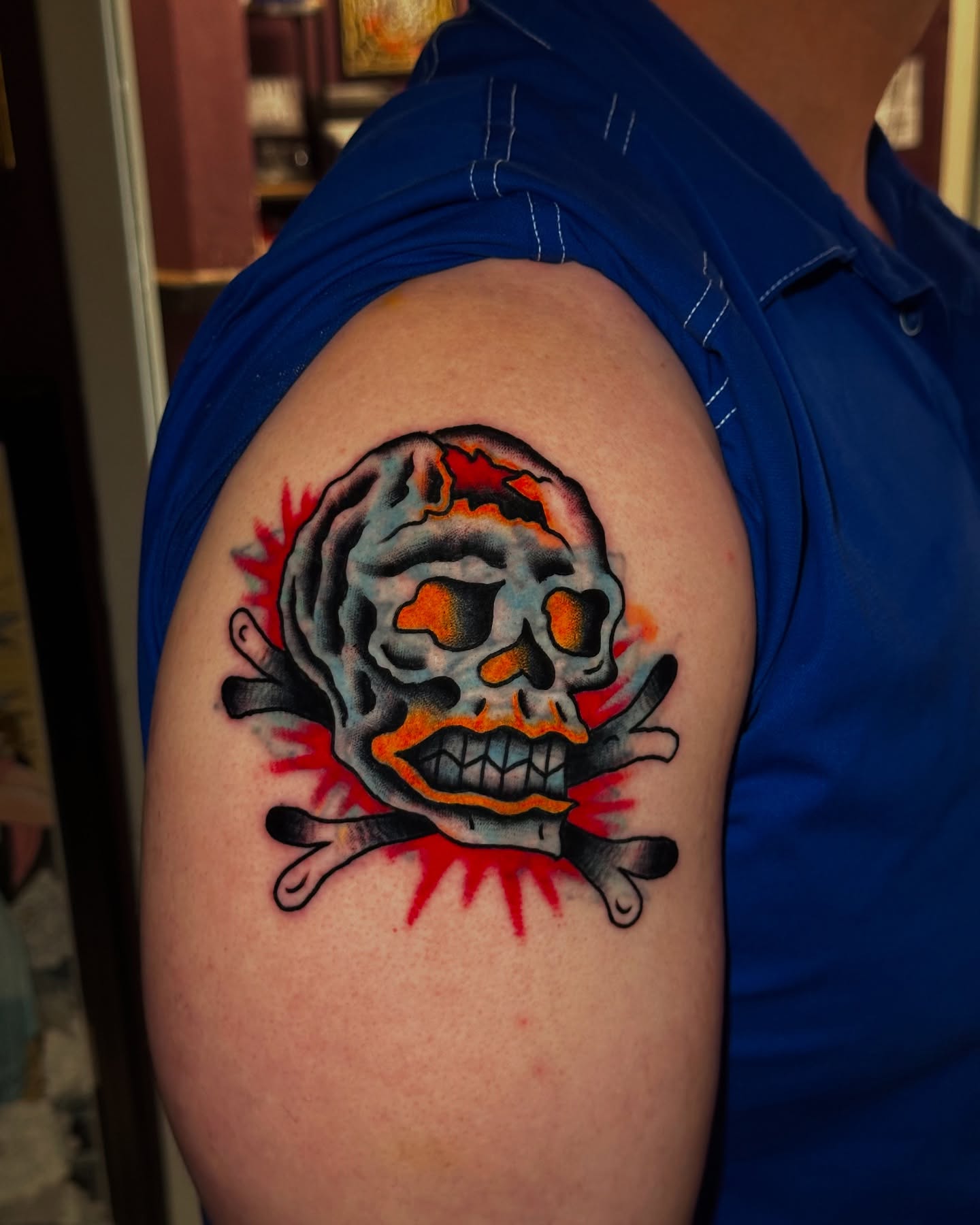 Skull and crossbones American traditional tattoo on the shoulder by Matthew, Georgetown, Texas