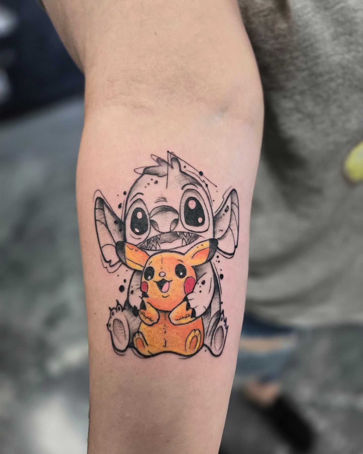 Lilo & Stitch dotwork tattoo on the forearm by Jon Griffin, Maryville, Tennessee