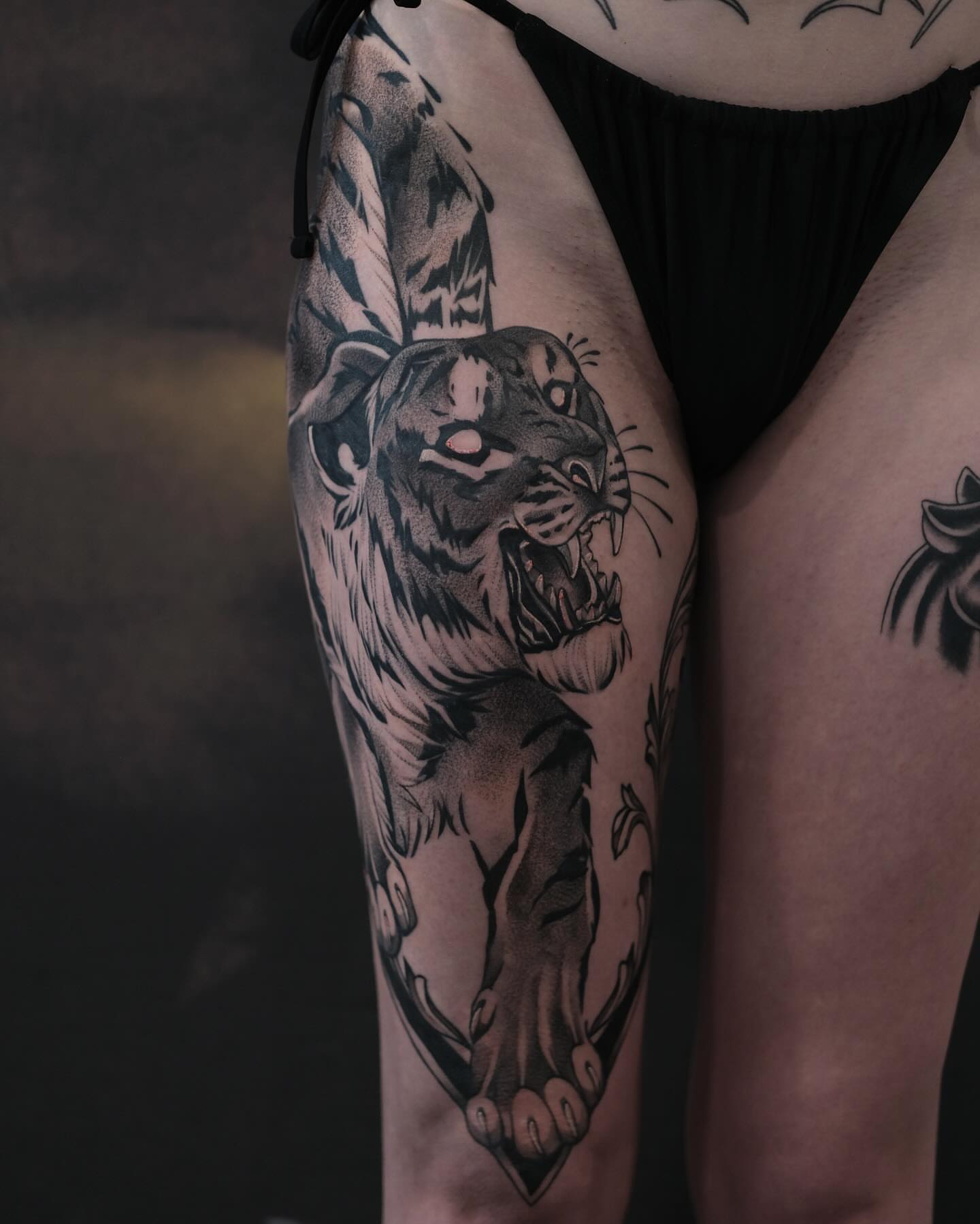 Tiger black and grey tattoo on the thigh by Isabelle Kellar, San Diego, California