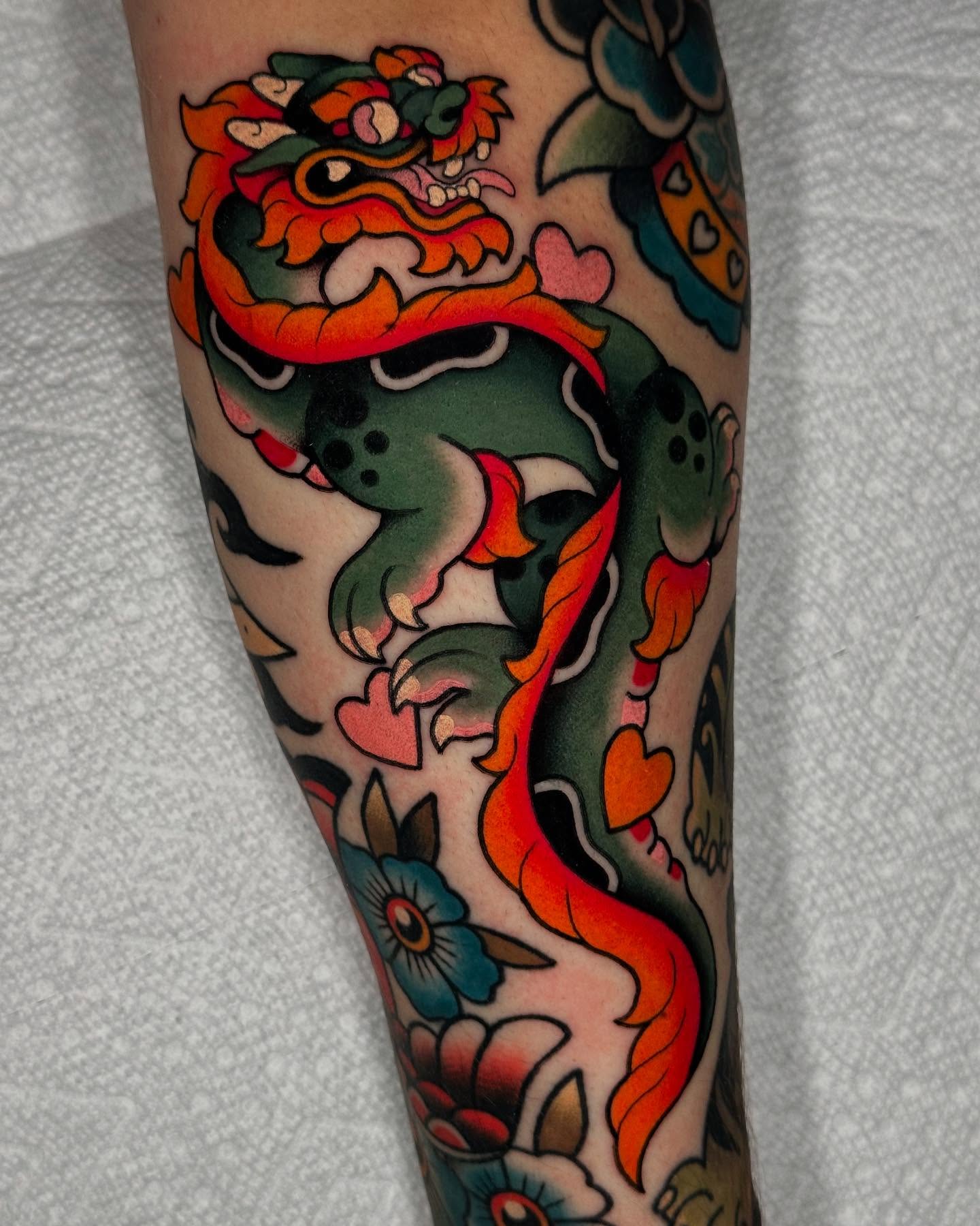 Lion and floral American traditional tattoo on the forearm by π»πππππ πΉπππ