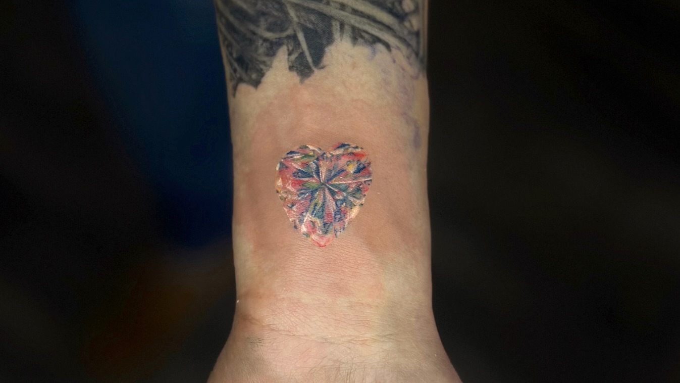 Heart geometric tattoo on the foot by Rose