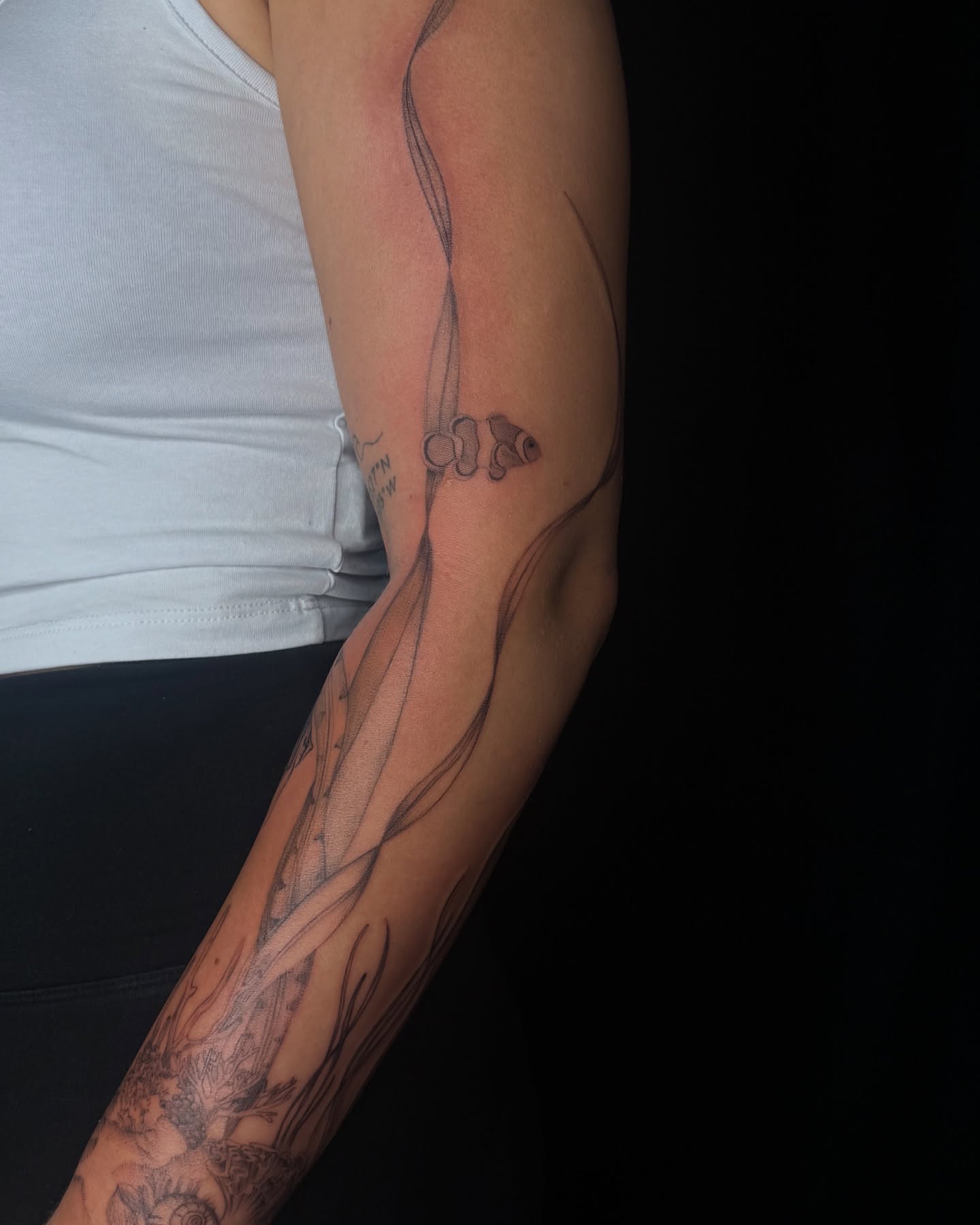 Abstract design black and grey tattoo on the forearm by elena