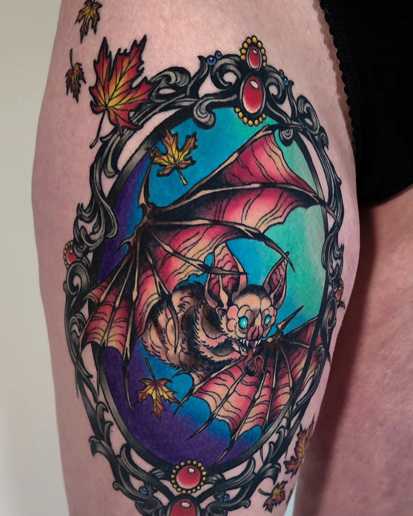 Bat neo-traditional tattoo on the thigh by Mariah Giovanna Hodgens