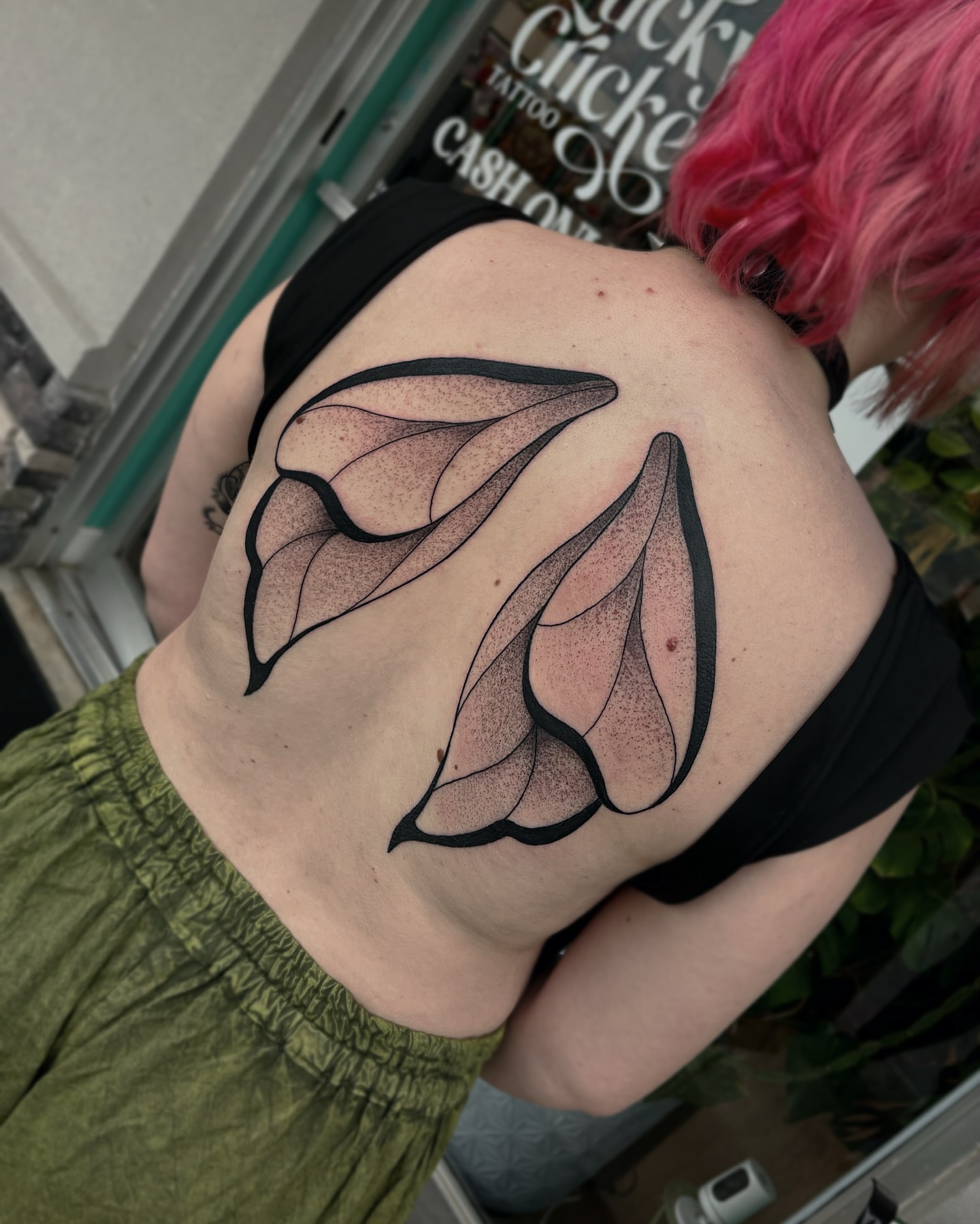 Abstract leaves dotwork tattoo on the back by Bunny Noel