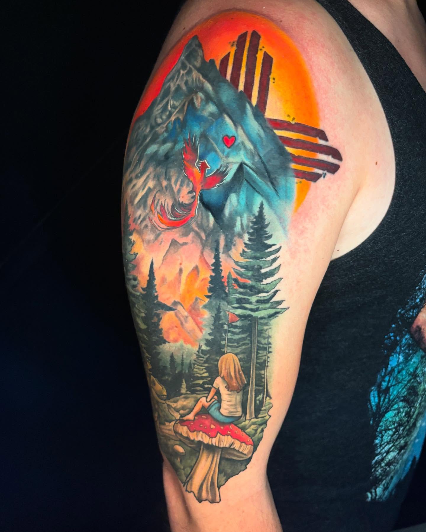 Mountain landscape realism tattoo on the upper arm by Chelsey Moore, Albuquerque, New Mexico