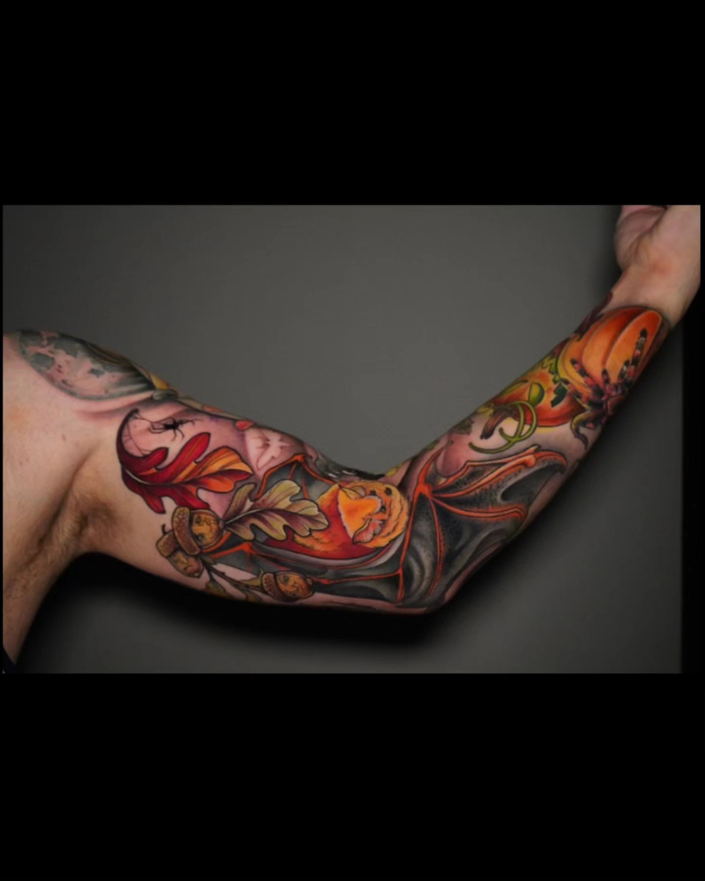Autumn leaves and fox American traditional tattoo on the forearm by Ashlynn Campbell