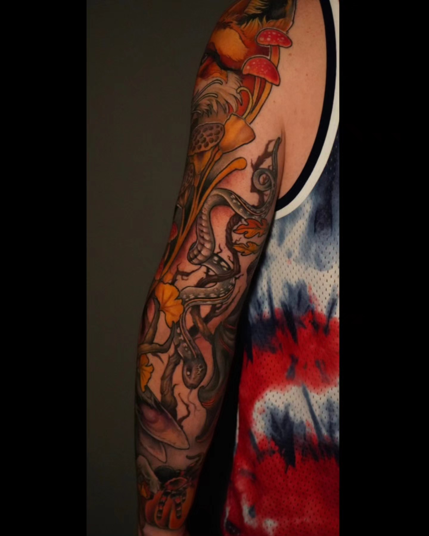 Snake and mushrooms American traditional tattoo on the forearm by Ashlynn Campbell