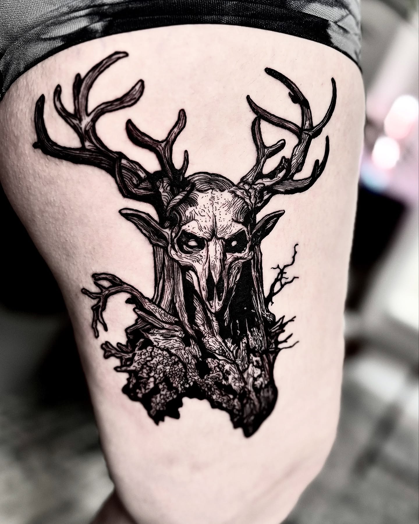 Stag skull dark realism tattoo on the thigh by Bwk Dark Art