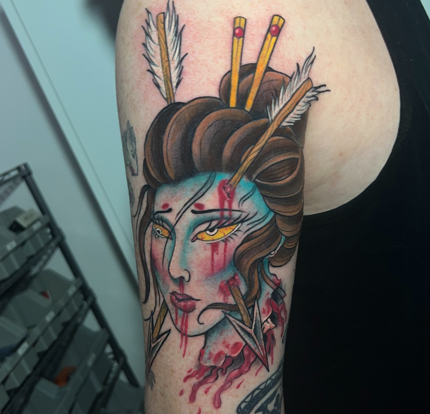 Geisha with arrows American traditional tattoo on the forearm by BodyArtByAlia
