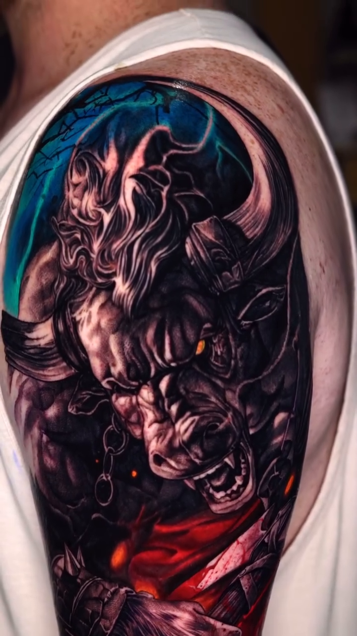 Minotaur with chains dark realism tattoo by Jake Ross, Mentor, Ohio