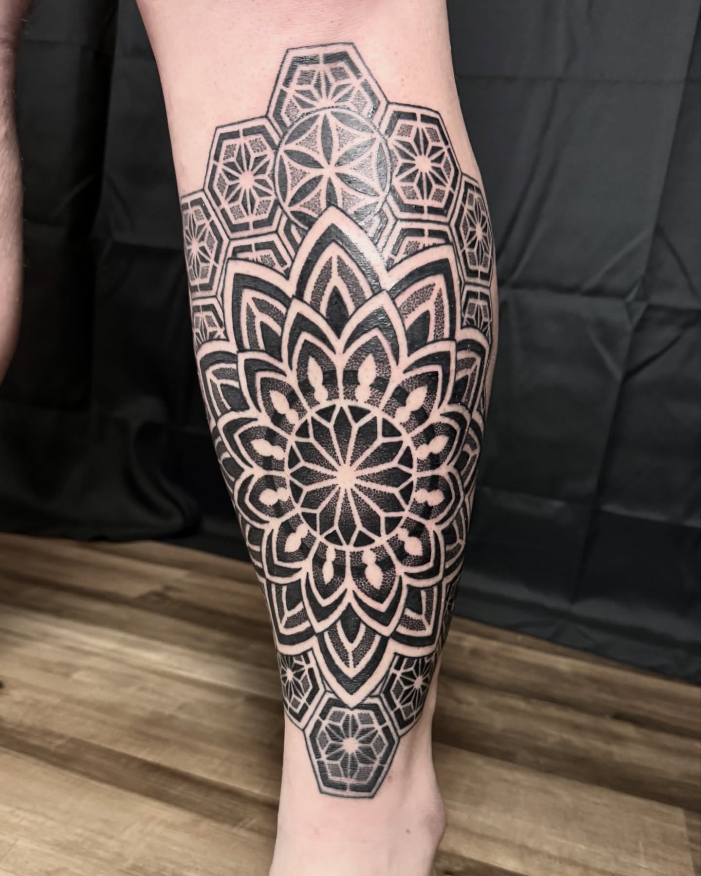 Geometric mandala geometric tattoo on the calf by Rose Ulinski