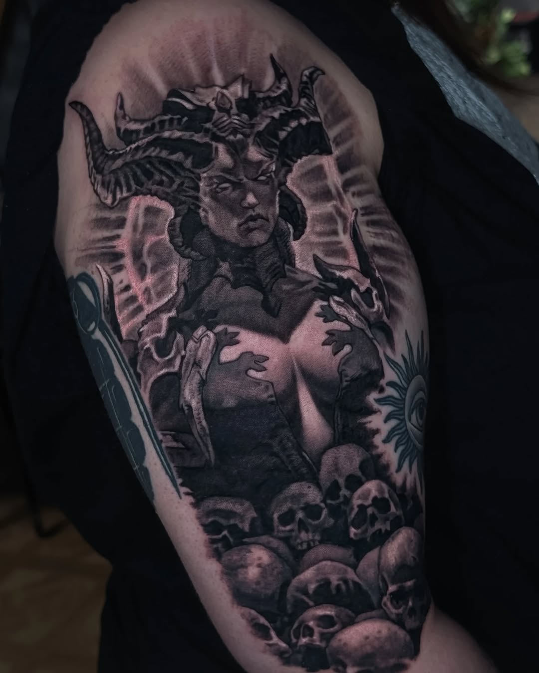 Demon queen with skulls realism tattoo on the forearm by Miami Florida Tattoo Artist