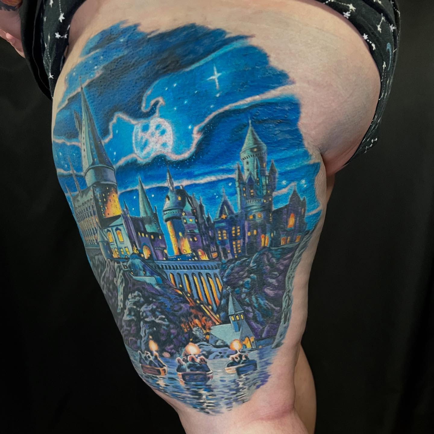 Hogwarts castle realism tattoo on the thigh by Patrick Cornolo