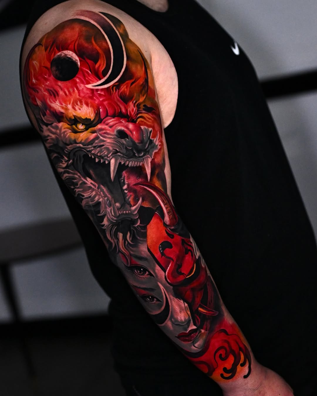 Dragon and geisha mask Japanese tattoo on the forearm by Marcos Salamanca