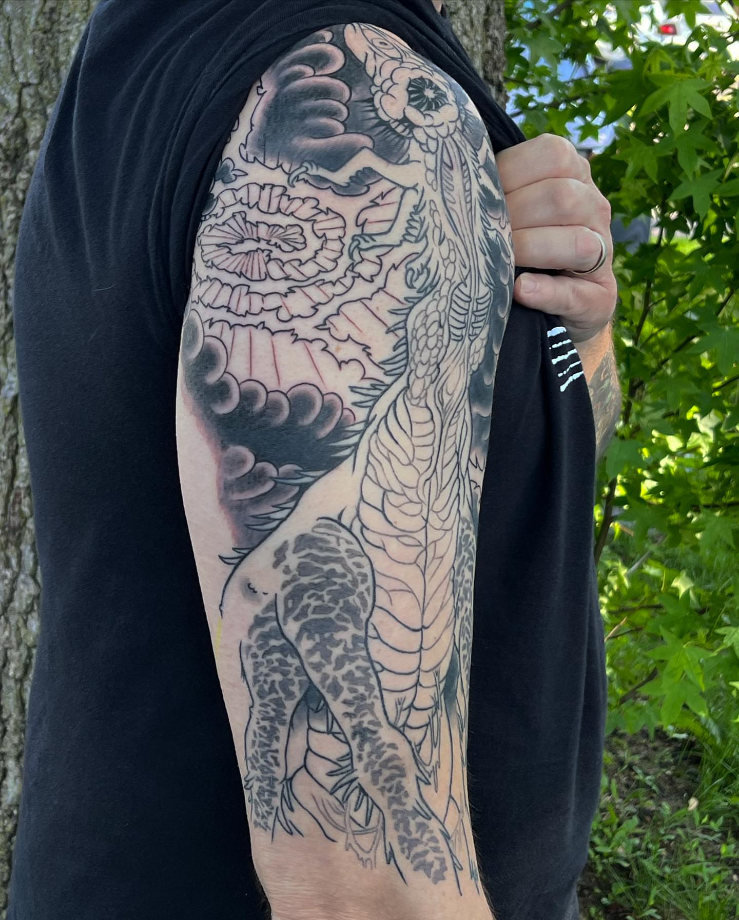 Dragon and flowers japanese irezumi tattoo on the forearm by TYP 419, Toledo, Ohio