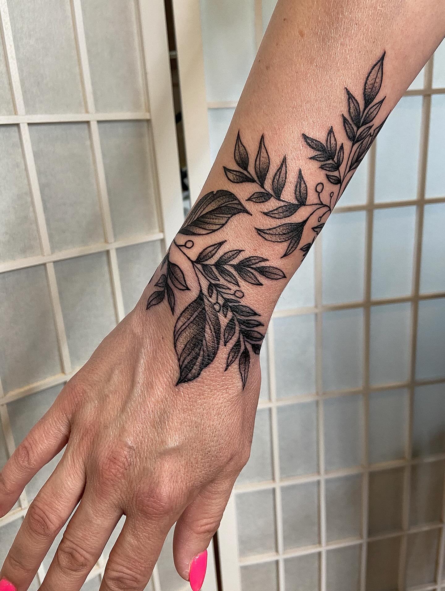Branch with leaves black and grey tattoo on the forearm by Tattoos by Dale Hupke, Lebanon, Ohio