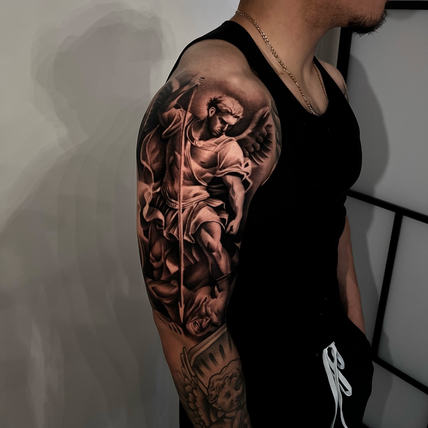 Tattoo by @alfredoadametattoo — realism, black_and_grey