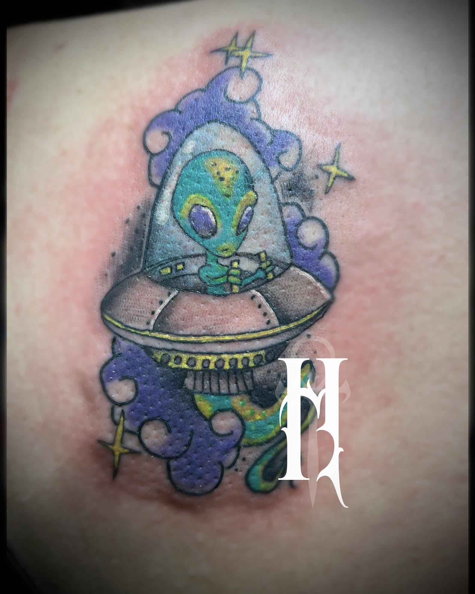 Alien in UFO dotwork tattoo on the thigh by Tattoos by Dan Hatcher Carr, Parma, Ohio