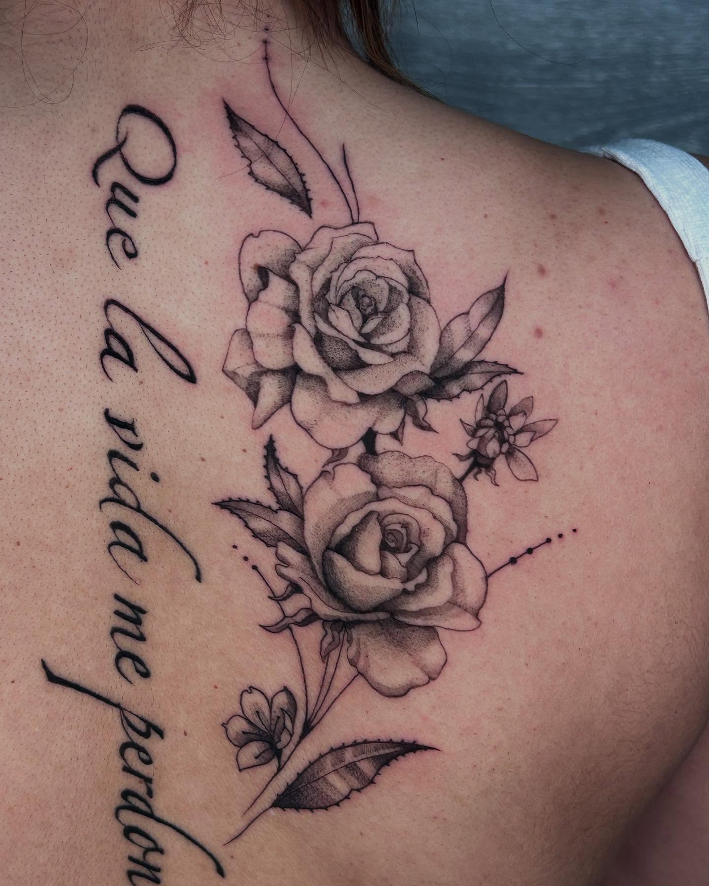 Roses and script realism tattoo on the shoulder by Kipling Mcclellan