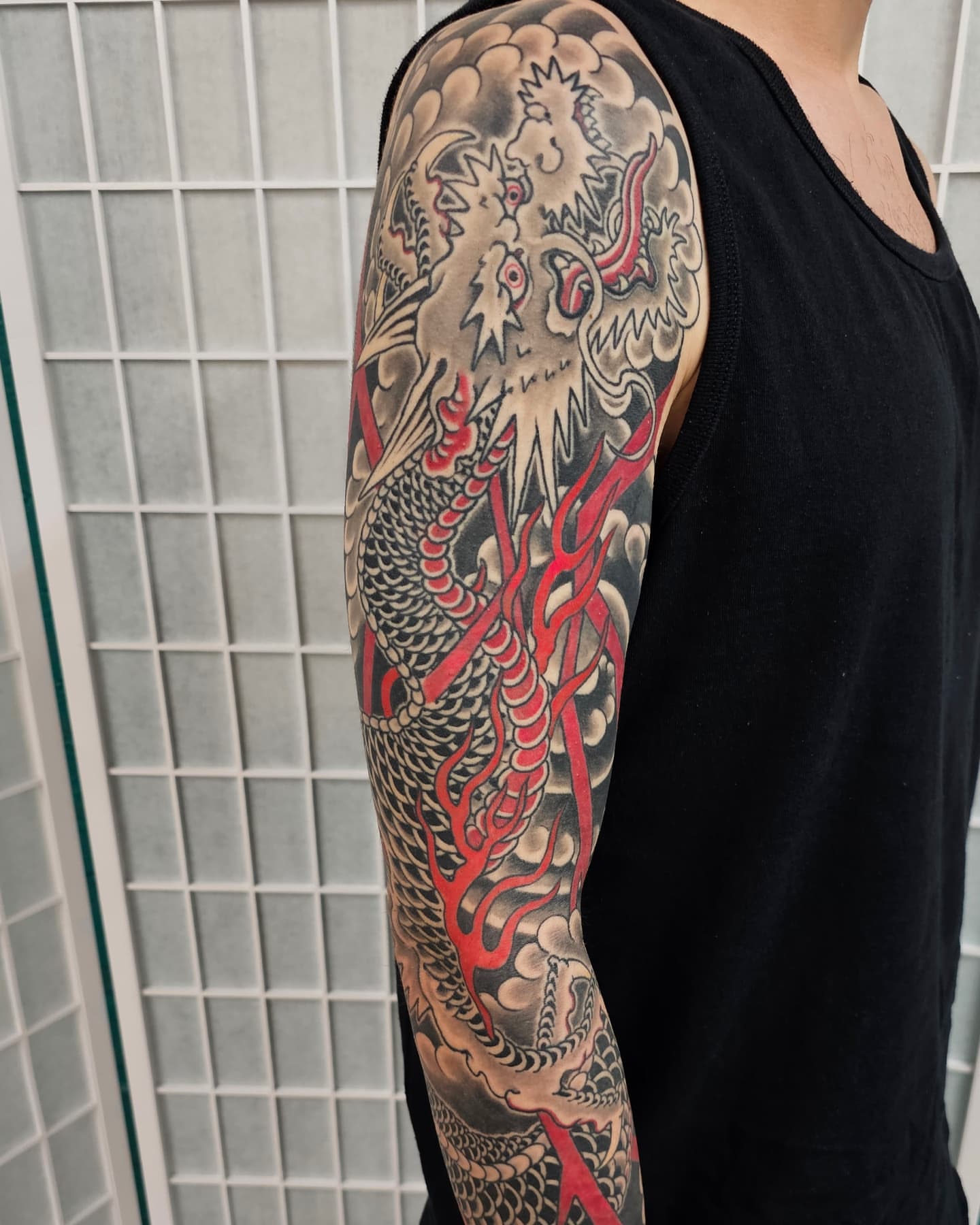 Dragon japanese irezumi tattoo on the upper arm by Avelourd Legaspi