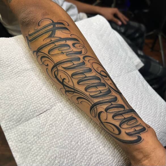 Script lettering lettering script tattoo on the forearm by $krypt