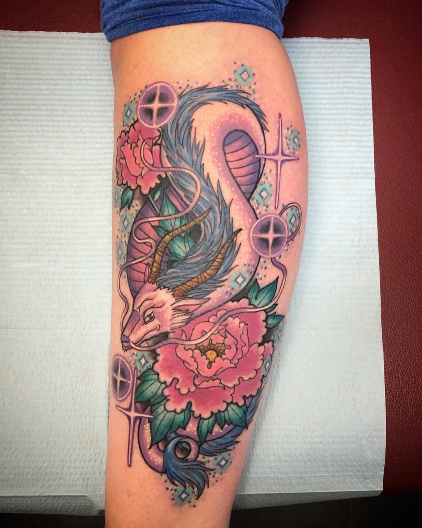 Peony and dragon new school tattoo on the calf by Shayna Soderstrom, Columbus, Ohio