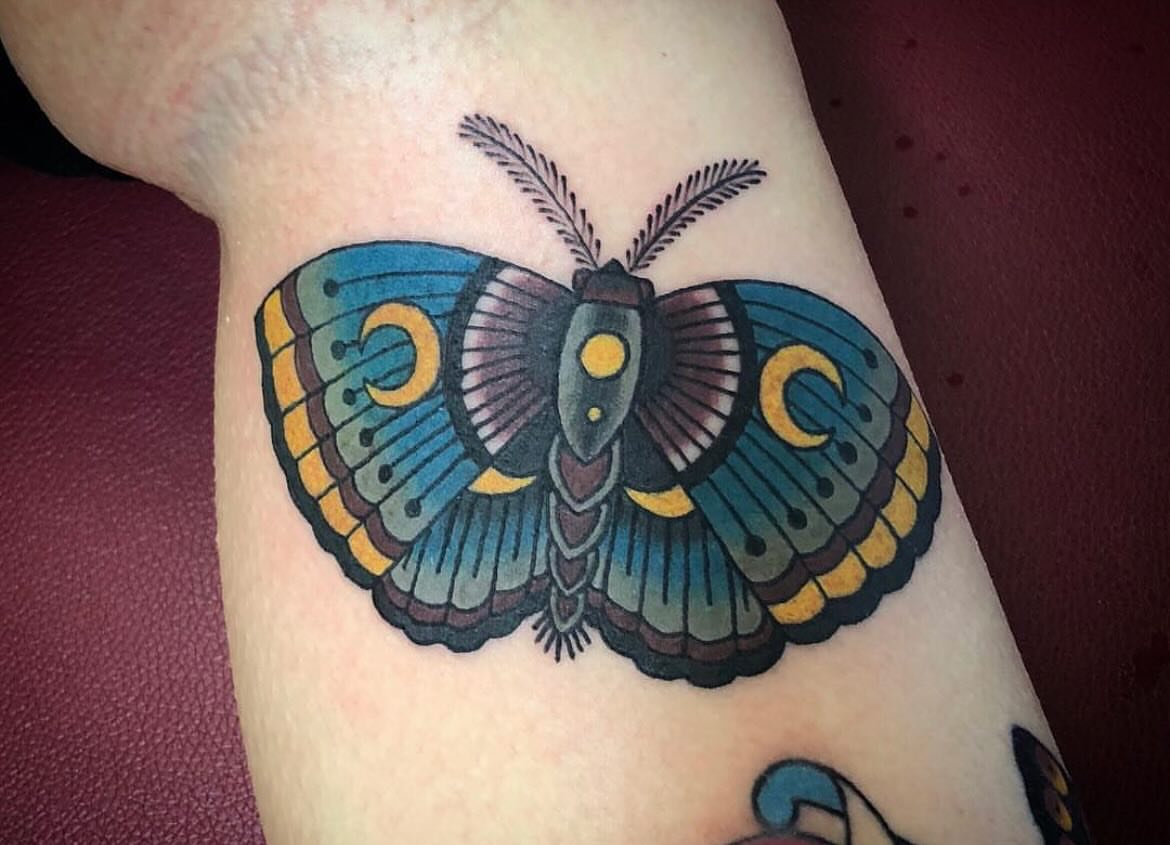 Moth American traditional tattoo on the forearm by Shayna Soderstrom, Columbus, Ohio