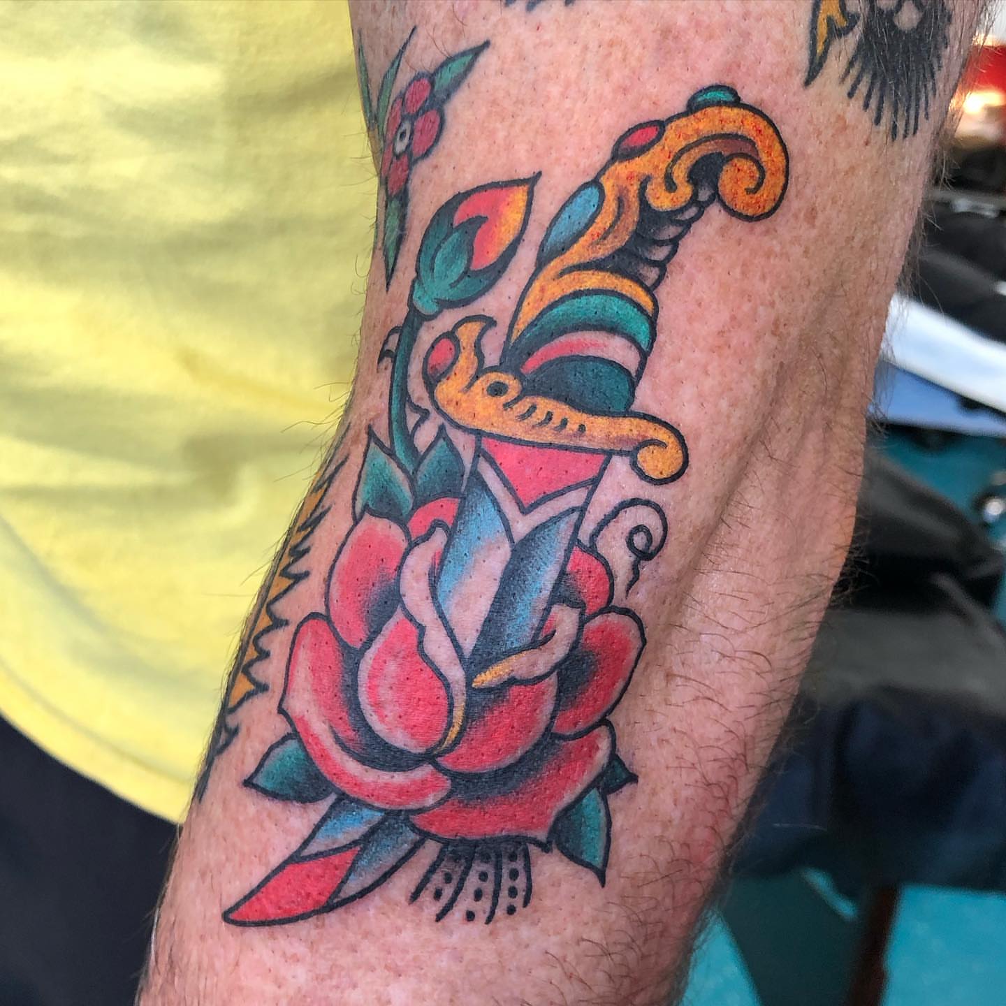 Sword and rose American traditional tattoo on the forearm by Matt Klass