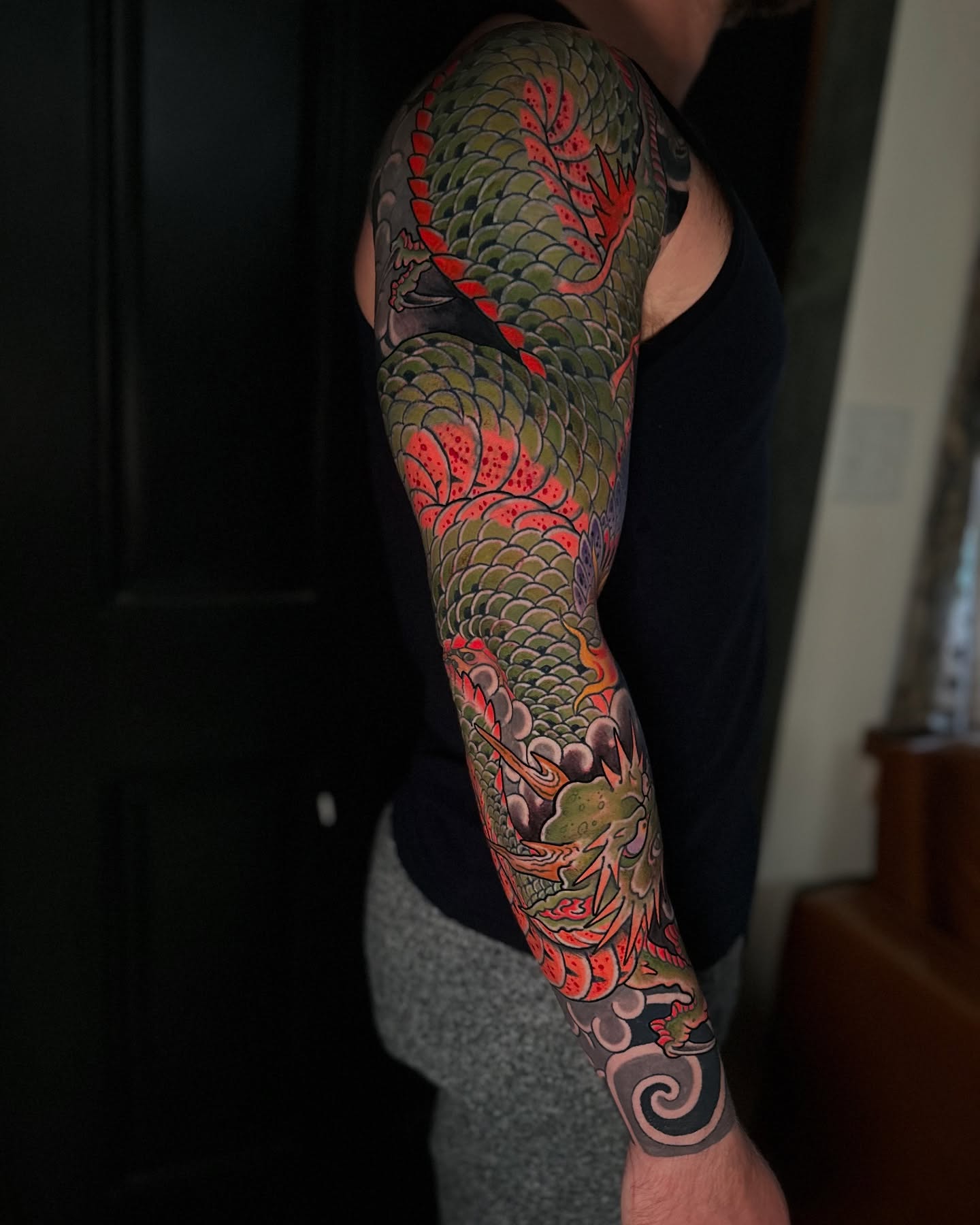 Dragon japanese irezumi tattoo on the upper arm by Chris Rogers