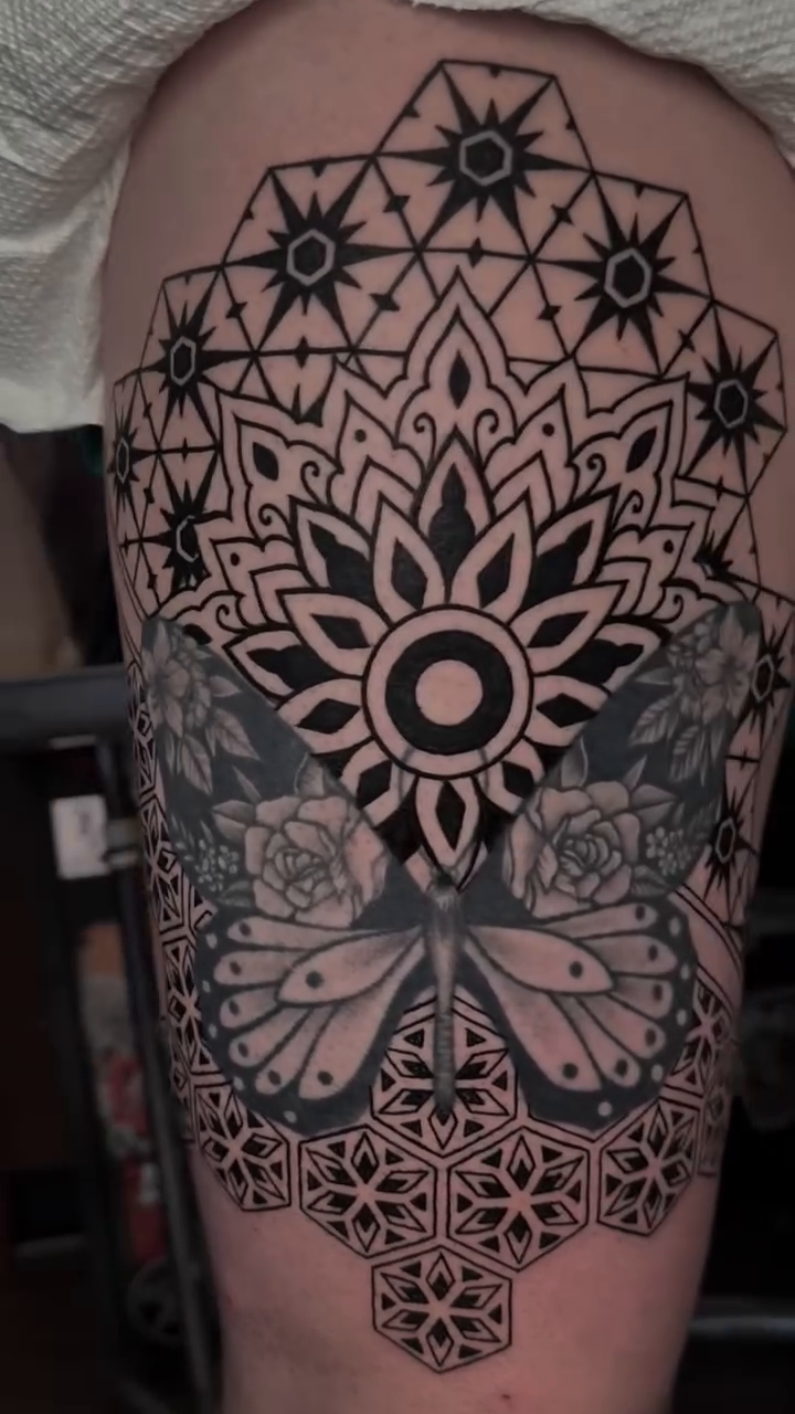 Mandala and butterflies geometric tattoo on the shoulder by Lisa Nikolopoulos, New York, New York