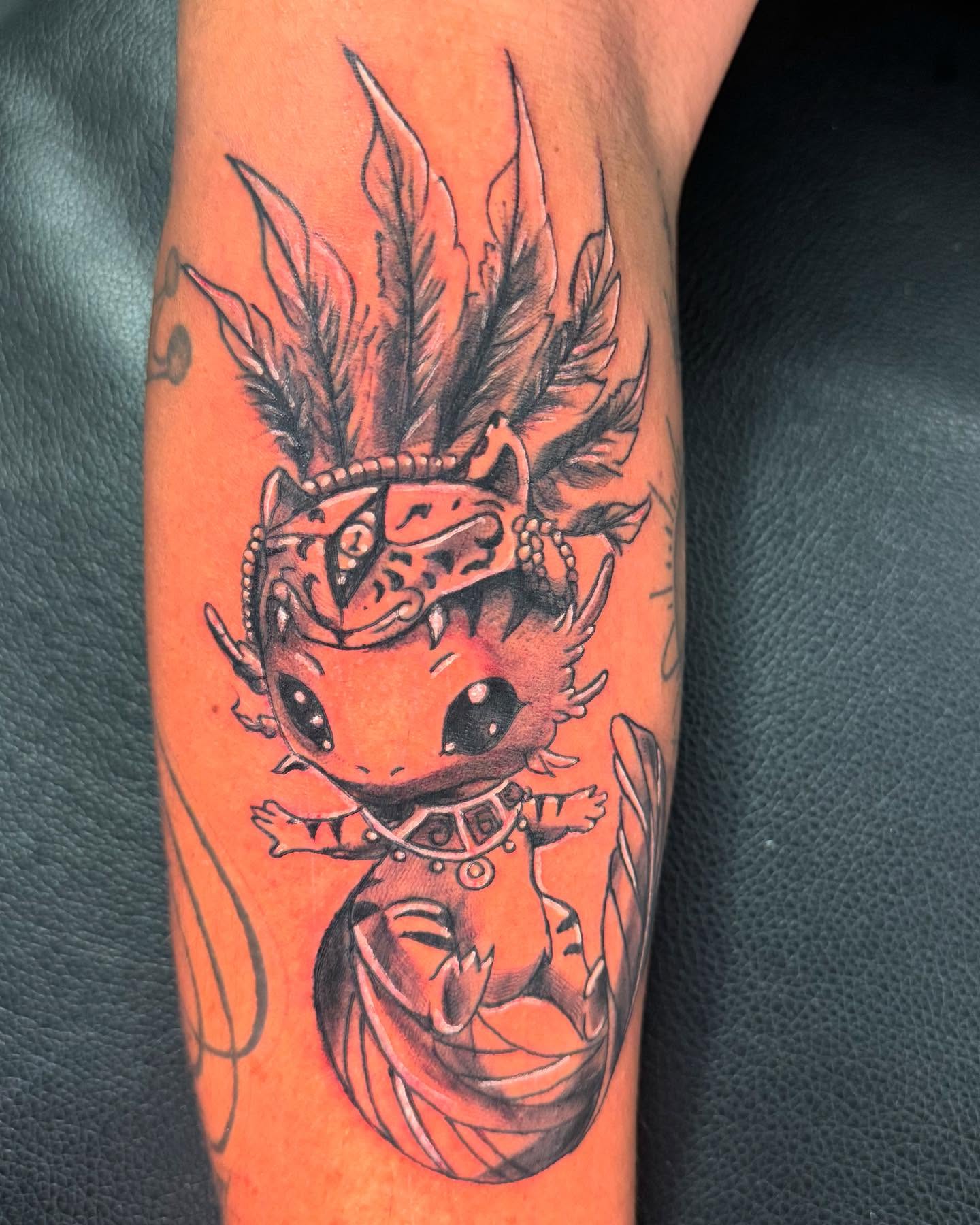 Chibi dragon dotwork tattoo on the forearm by Therapy ink