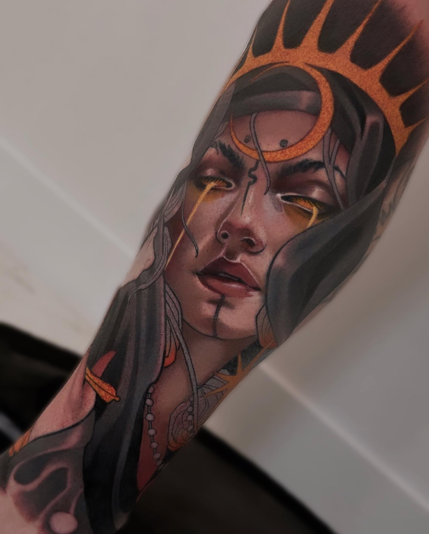 Woman's face realism tattoo on the forearm by Levi Murphy