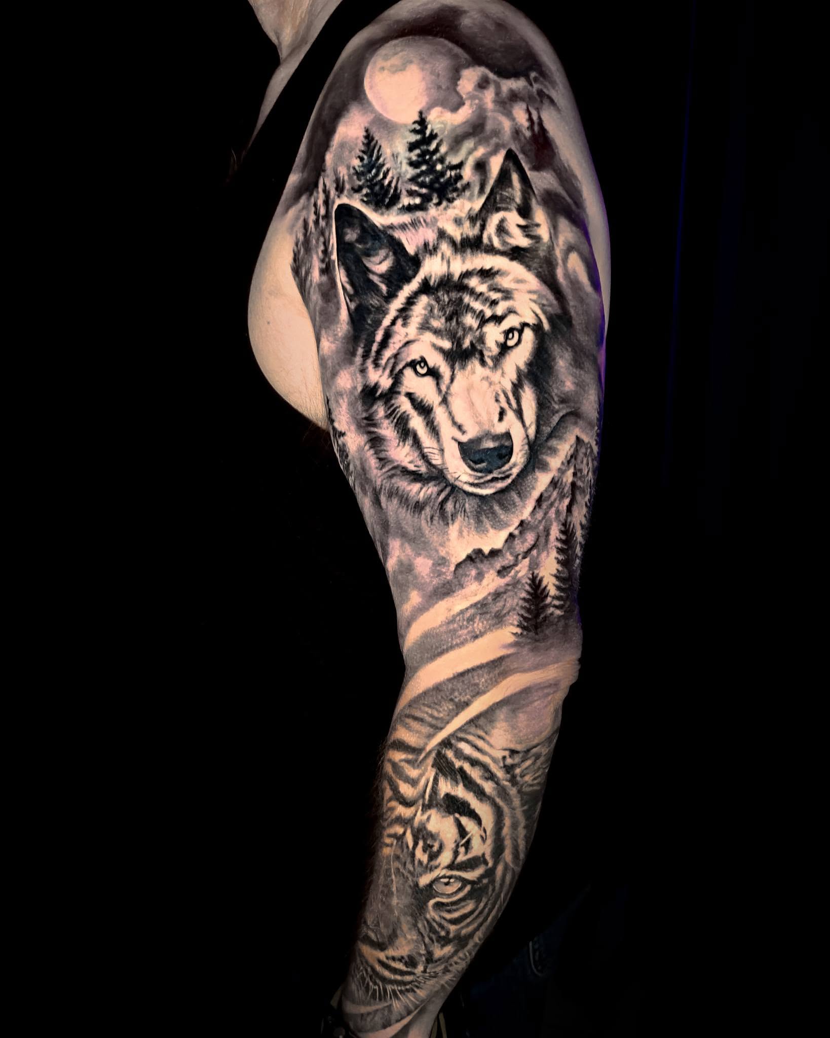Wolf realism tattoo on the forearm by Dallas Tattoo Artist Erik Espinoza