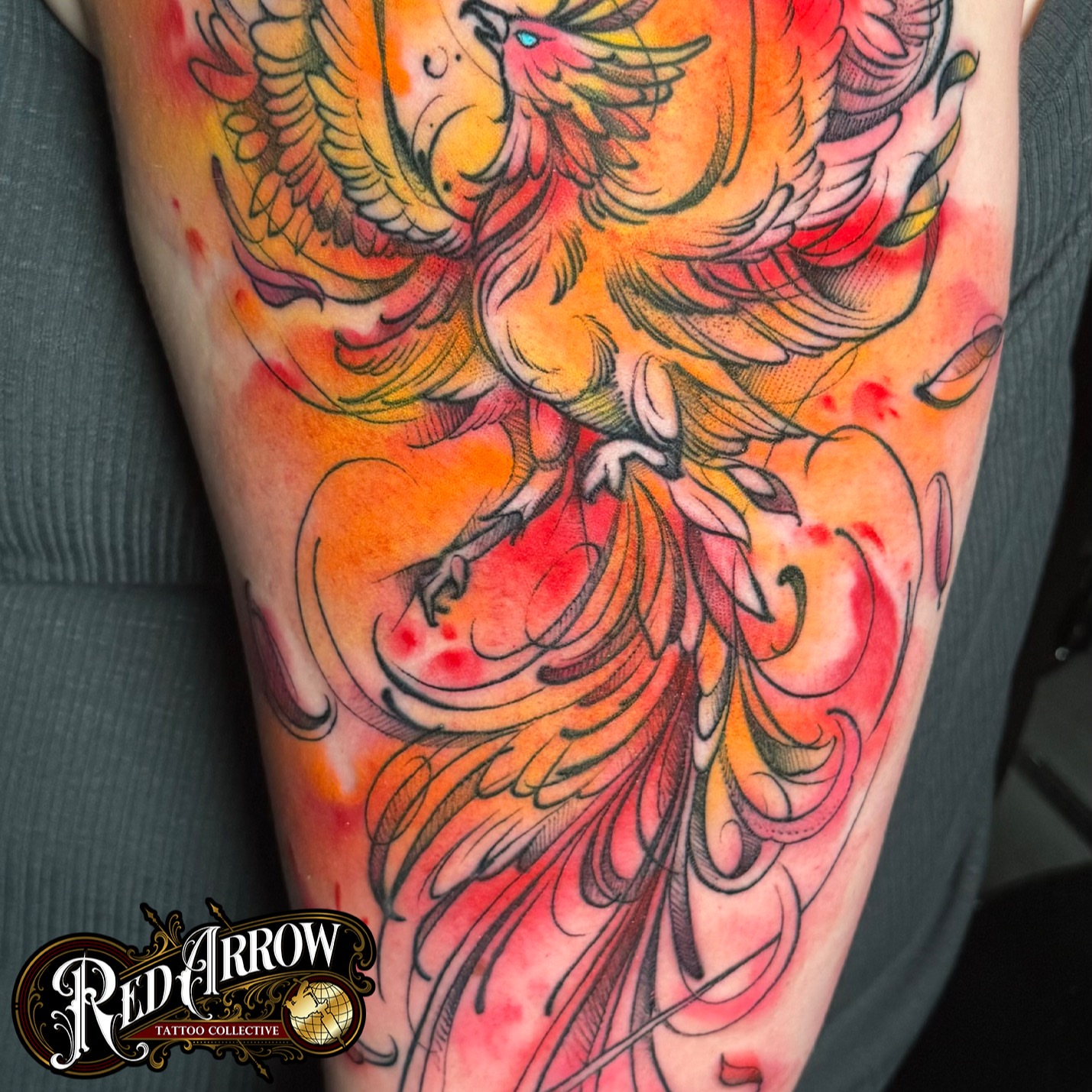 Phoenix watercolor tattoo on the thigh by 𝕽𝖊𝖉 𝕬𝖗𝖗𝖔𝖜 𝕿𝖆𝖙𝖙𝖔𝖔 𝕮𝖔𝖑𝖑𝖊𝖈𝖙𝖎𝖛𝖊, Troy, Michigan