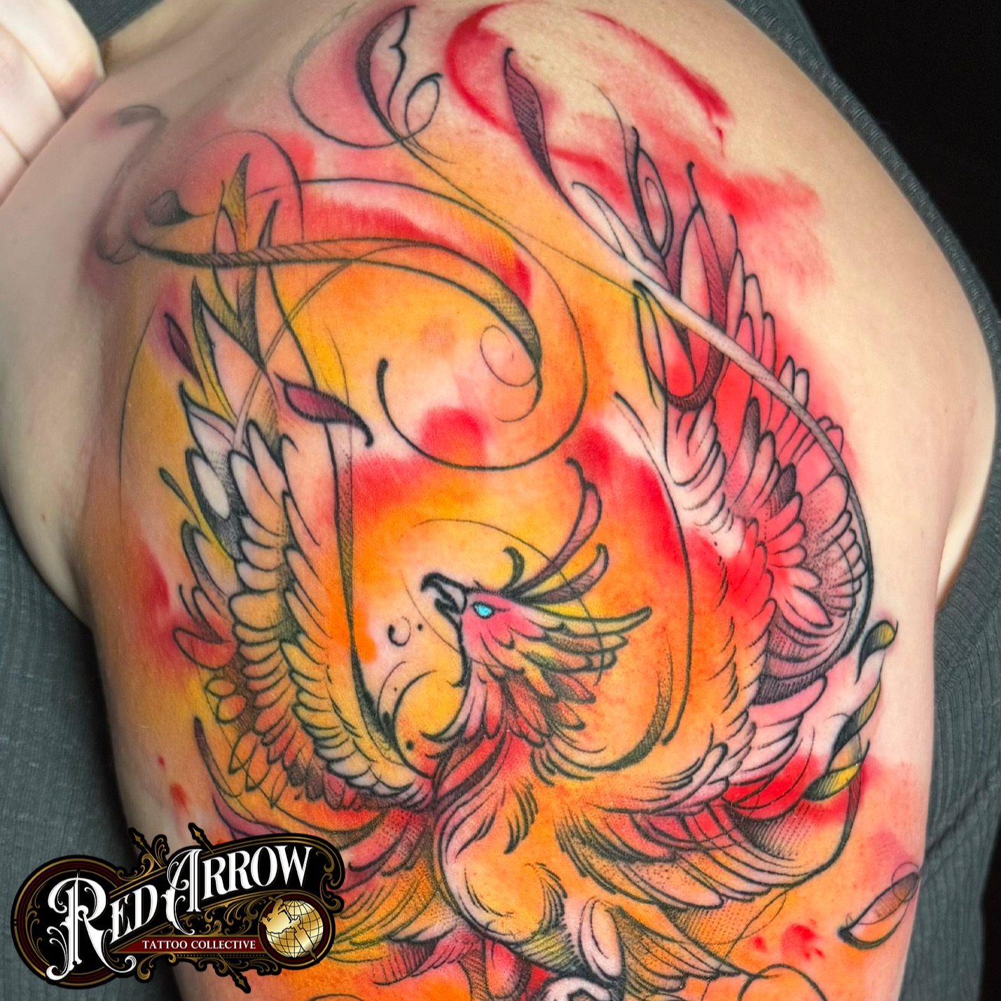 Phoenix new school tattoo on the shoulder by 𝕽𝖊𝖉 𝕬𝖗𝖗𝖔𝖜 𝕿𝖆𝖙𝖙𝖔𝖔 𝕮𝖔𝖑𝖑𝖊𝖈𝖙𝖎𝖛𝖊, Troy, Michigan