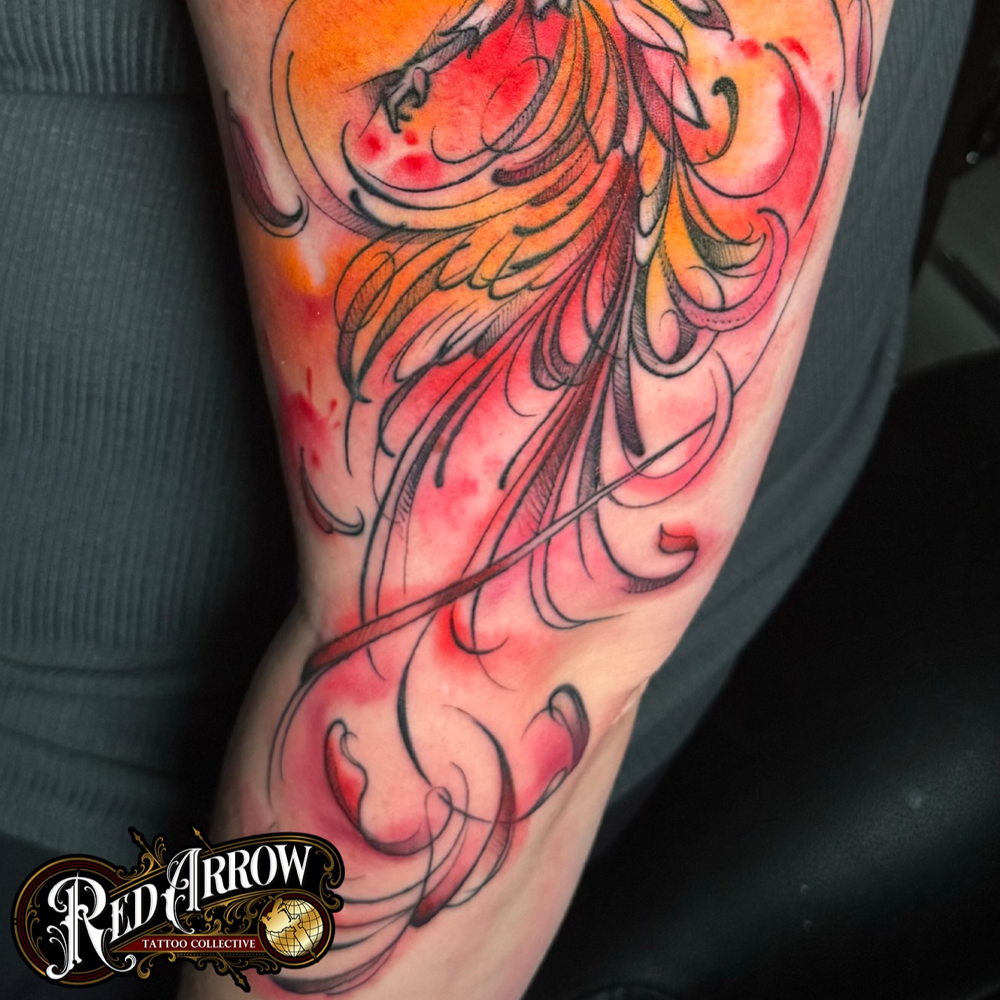 Flame watercolor tattoo on the forearm by 𝕽𝖊𝖉 𝕬𝖗𝖗𝖔𝖜 𝕿𝖆𝖙𝖙𝖔𝖔 𝕮𝖔𝖑𝖑𝖊𝖈𝖙𝖎𝖛𝖊, Troy, Michigan