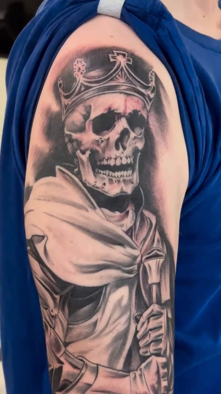 Skeleton warrior with crown and goggles realism tattoo by Mason Williams