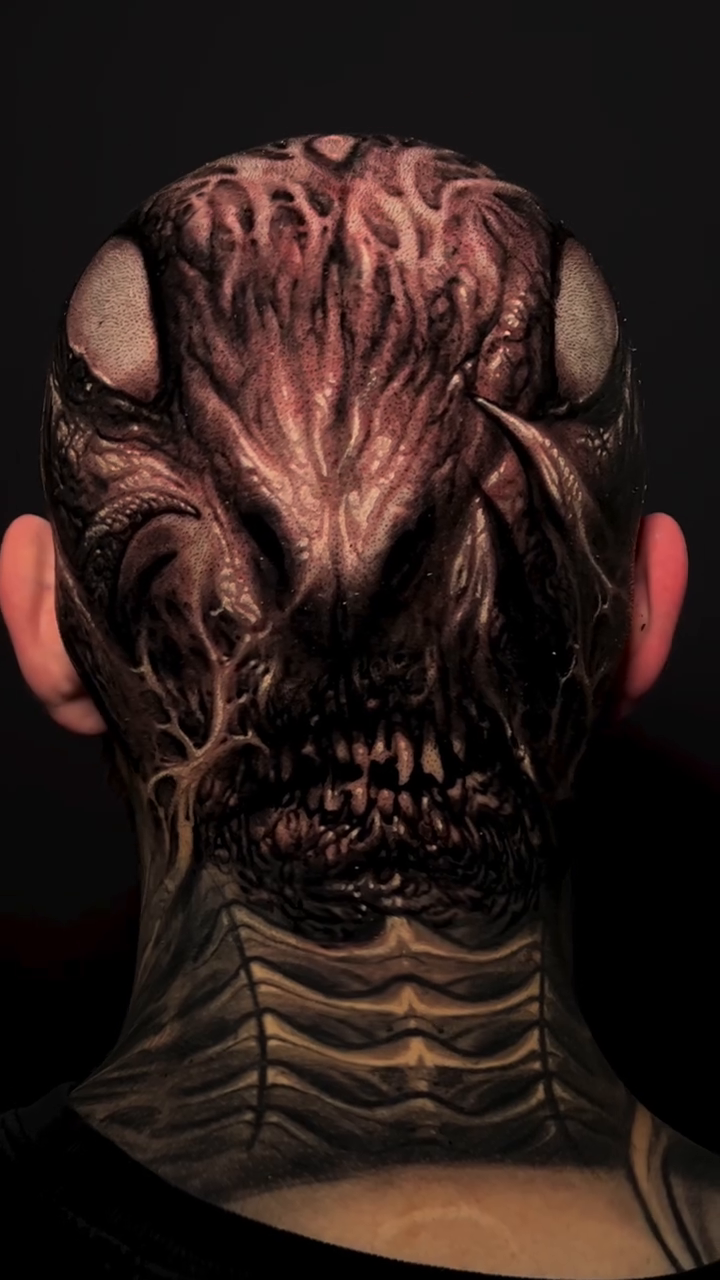 Monstrous face dark realism tattoo by David Jorquera