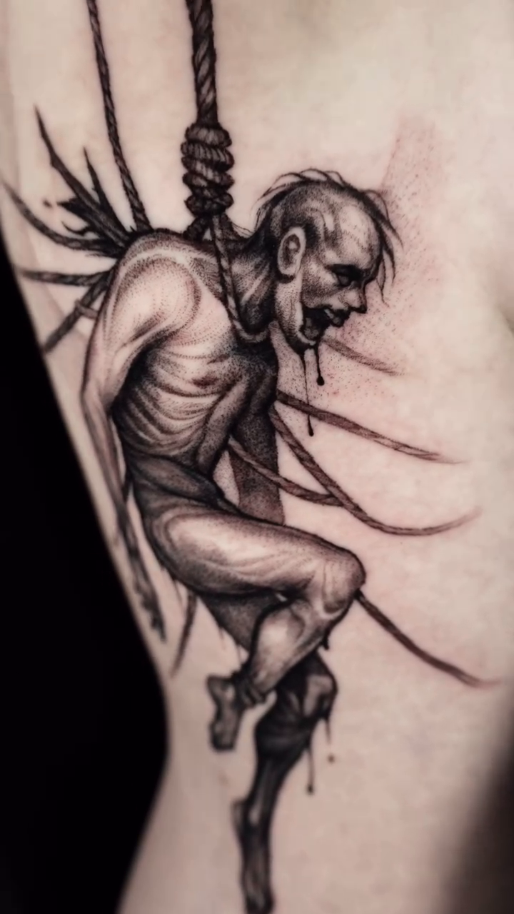 Hanging emaciated figure dark realism tattoo by Anna Chernova, San Francisco, California