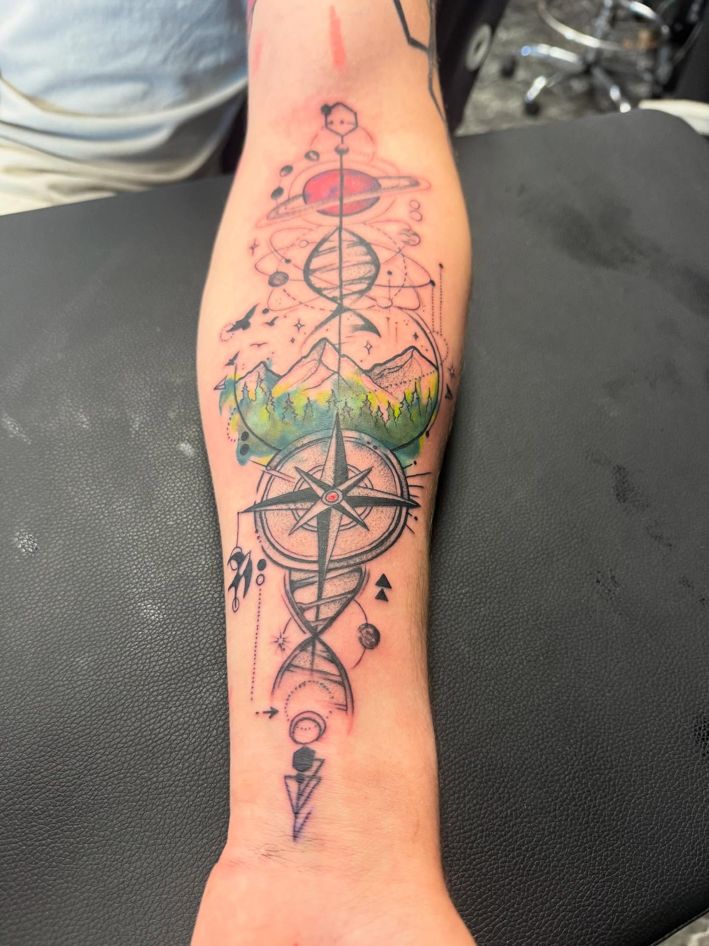 Tattoo by @scottys_ink315 — geometric, watercolor