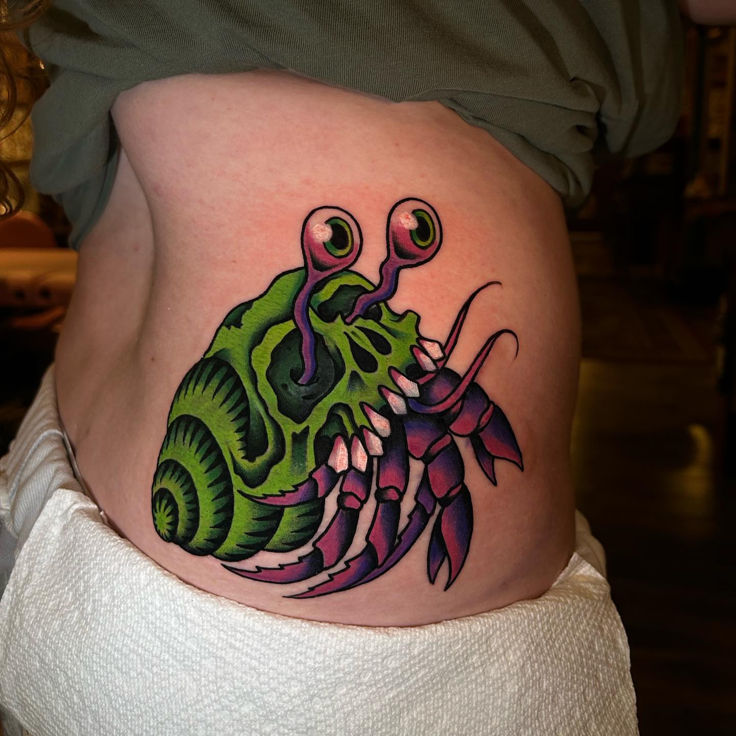 Lobster American traditional tattoo on the thigh by Lexi Kniskern