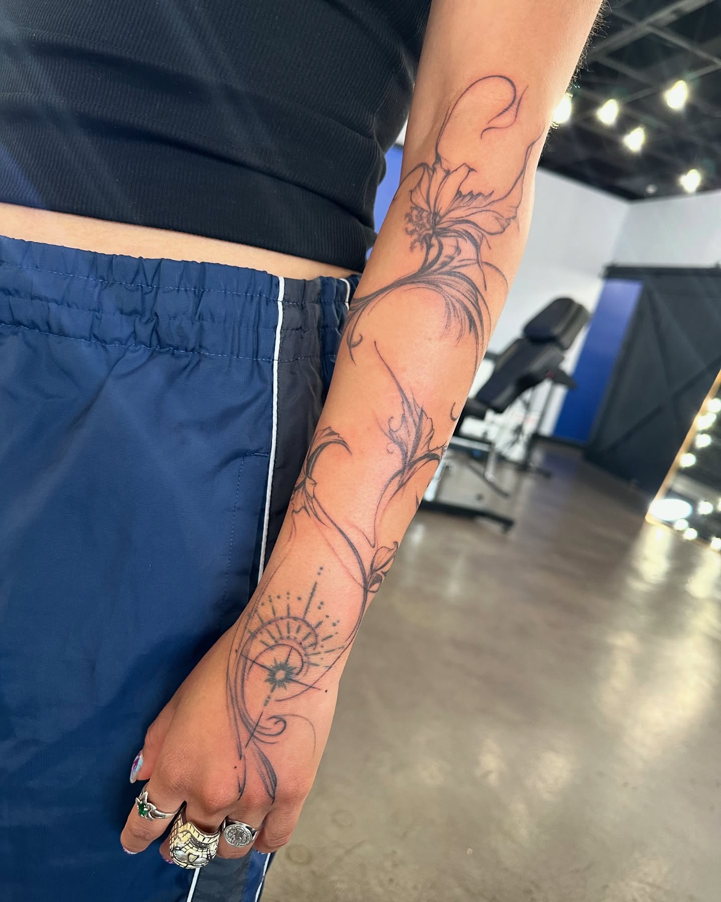 Floral design black and grey tattoo on the forearm by Cameron Hobbs, Woodbridge, Virginia