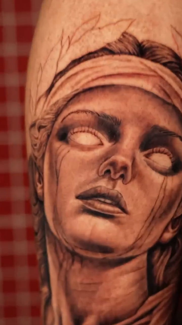 Woman's face realism tattoo by Tiago Britto