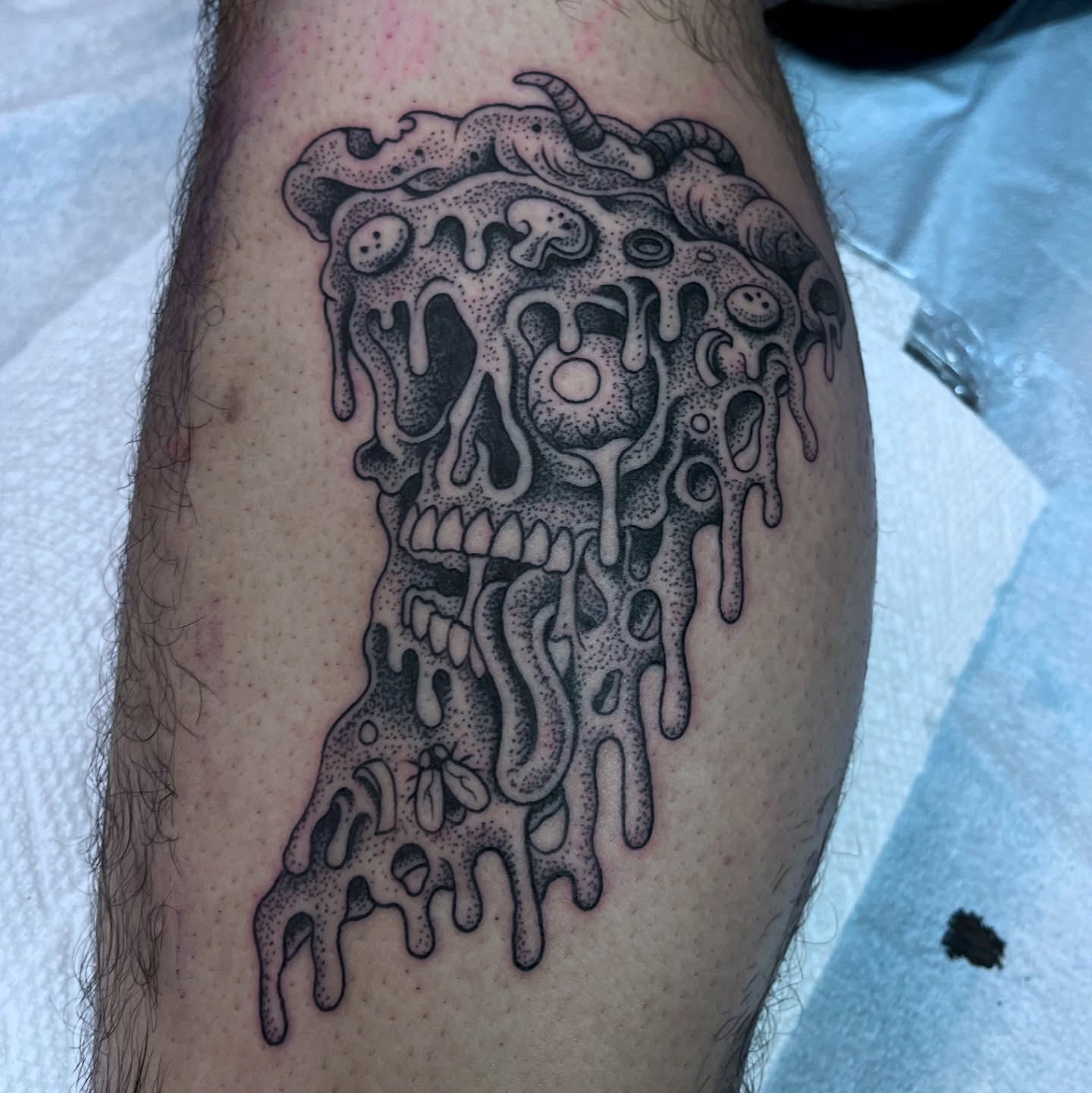 Melting skull dotwork tattoo on the forearm by ☠︎ ︎𝗘𝗩𝗔 ☠︎︎
