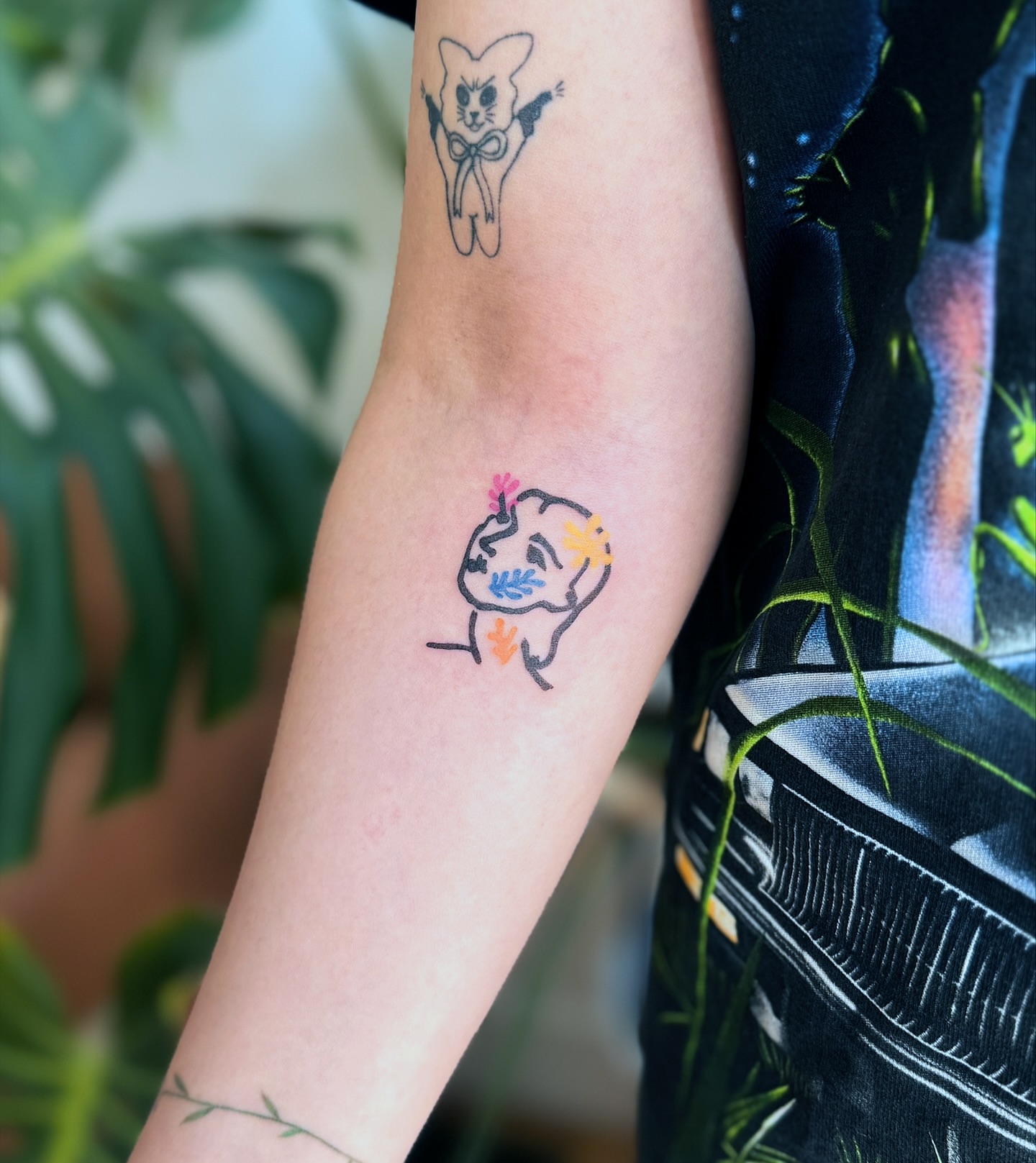 Cat dotwork tattoo on the forearm by Jennifer Fuster